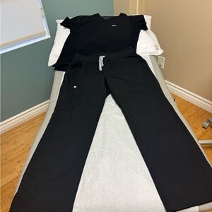 Figs Black. V neck top.